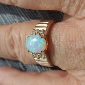 Size 8 Fire Opal ring with six small accent stones